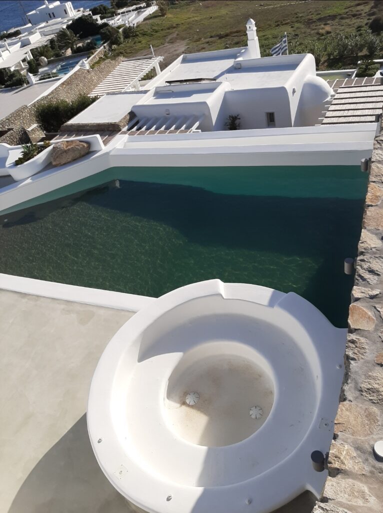 Completed swimming pool and circular jacuzzi in Mykonos